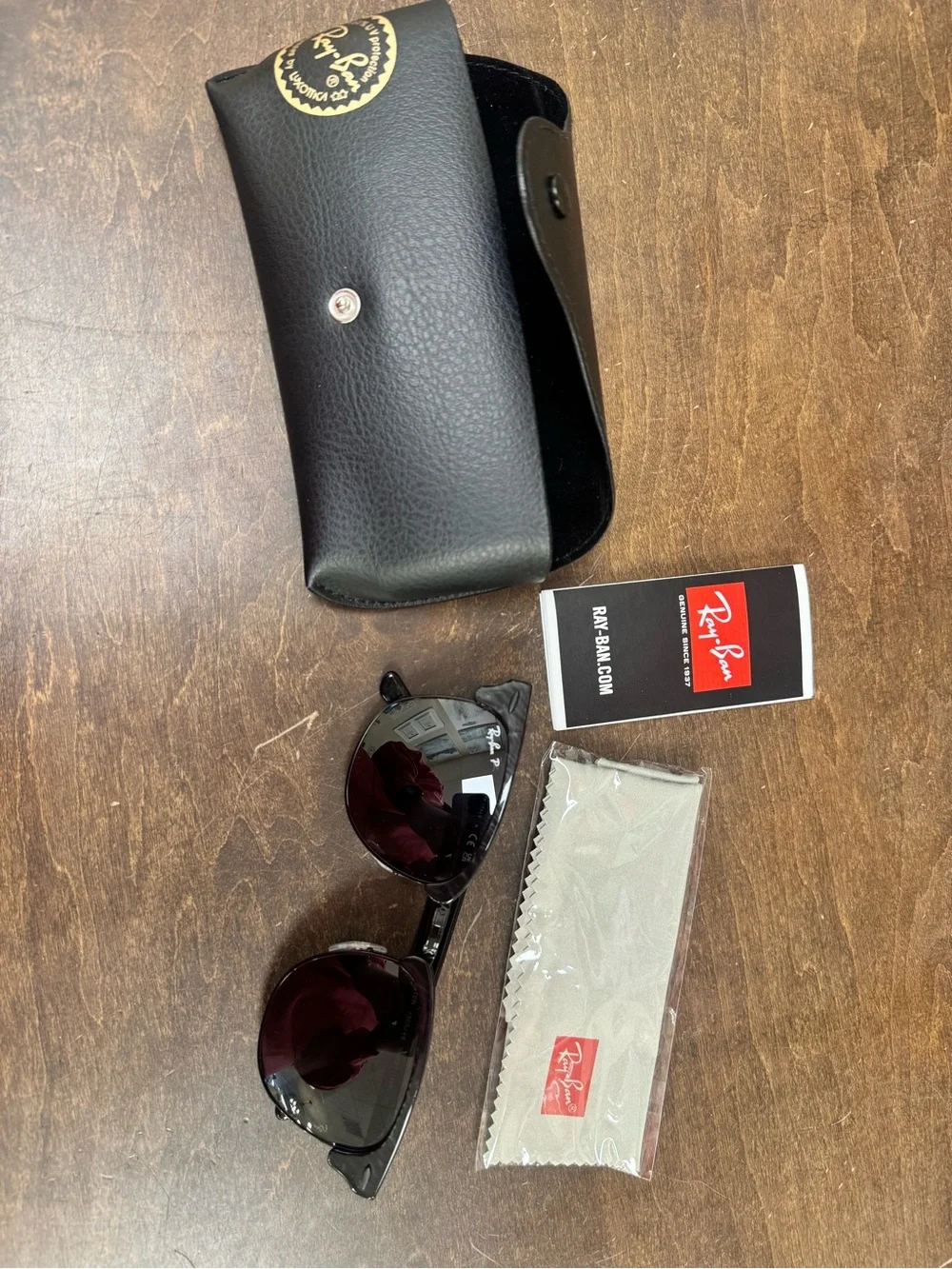 Ray-Ban Women’s Black Frame with Dark Red Lenses Sunglasses